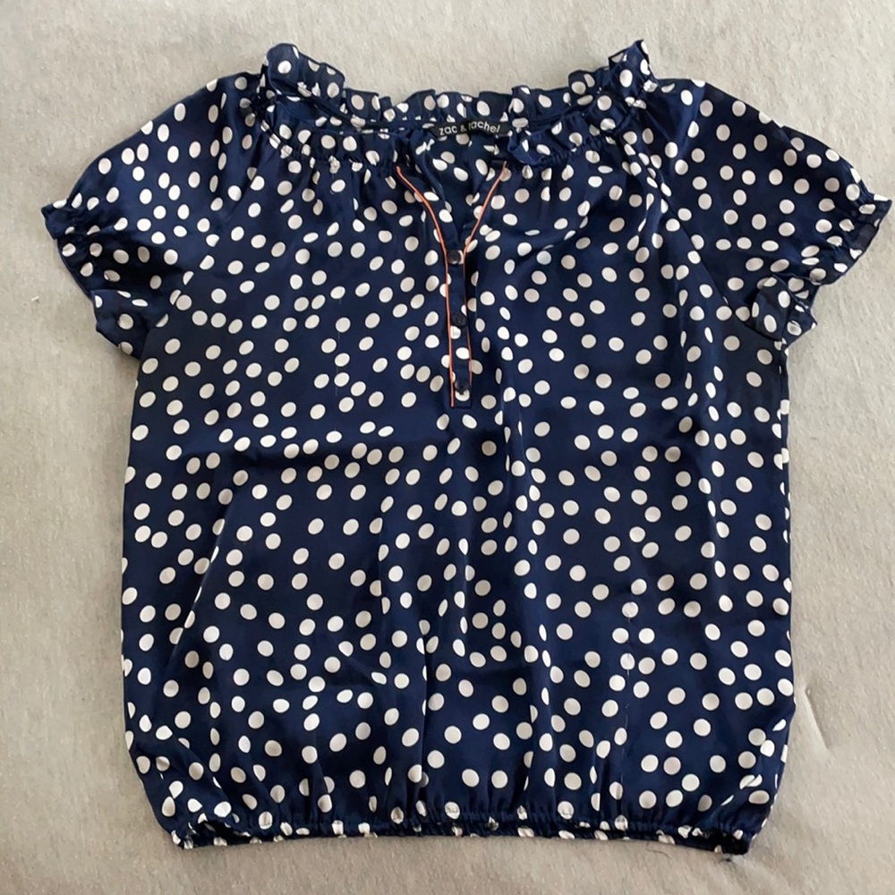 Blue/White polka dot blouse with orange lining at collar